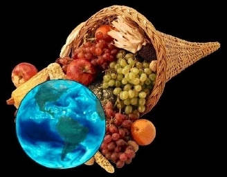 Allerlei gemalte Früchte, darunter die Erde als blauer Planet fotografiert, aus Sprachfüllhornzeichnung 'fallend'